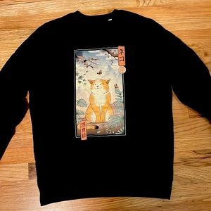 Black crewneck sweater with adorable Japanese cat on front
